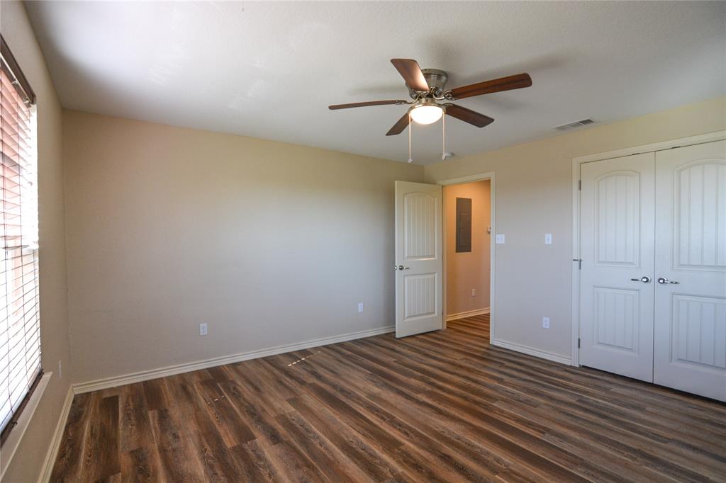 322 Hcr 2320 Abbott, TX 76621 - Photo 25 of 40 wooden floor in an empty room with a window