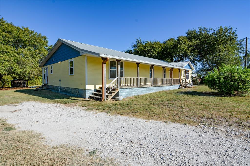 322 Hcr 2320 Abbott, TX 76621 - Photo 6 of 40 a view of a house with backyard and trees