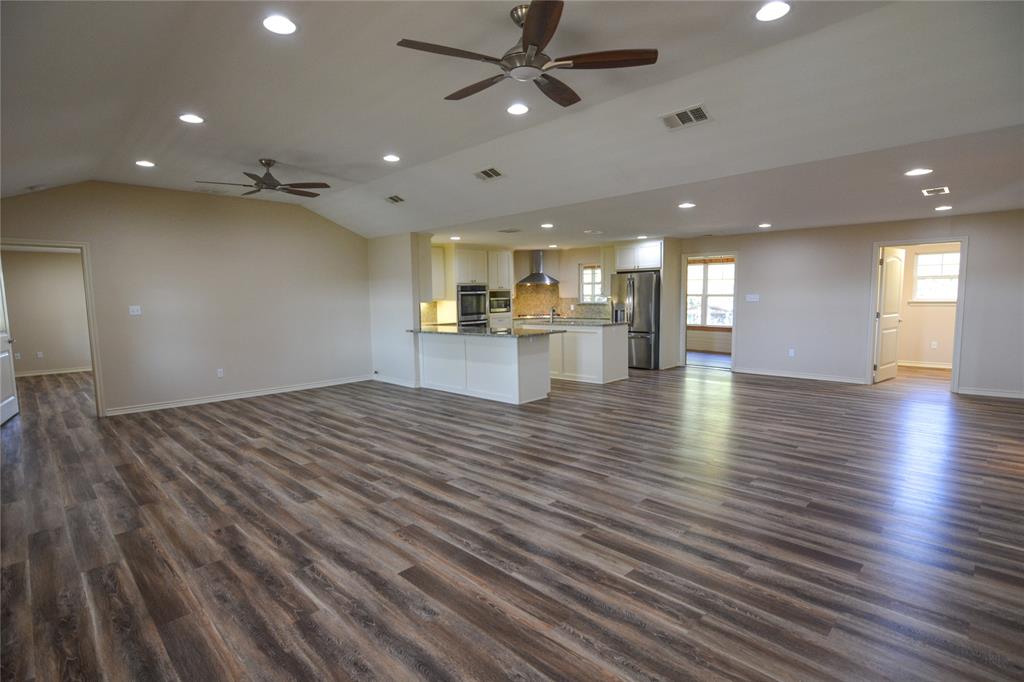 322 Hcr 2320 Abbott, TX 76621 - Photo 8 of 40 an empty room with wooden floor and windows