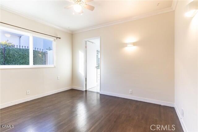 412 South Kenneth Road Burbank, CA 91501 - Photo 11 of 24 an empty room with wooden floor and windows