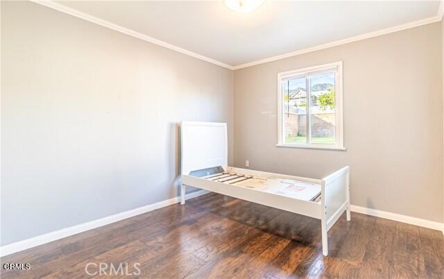 412 South Kenneth Road Burbank, CA 91501 - Photo 13 of 24 a bedroom with a bed and a window
