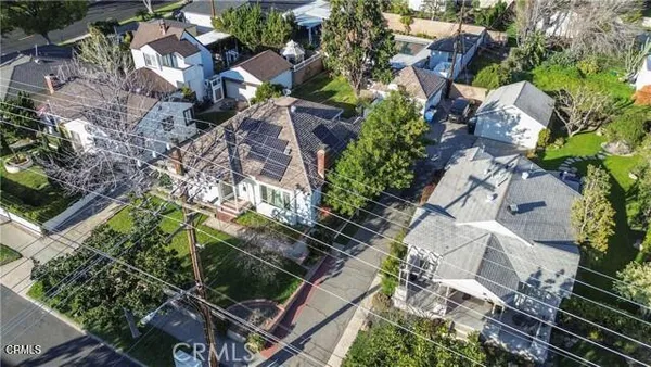 an aerial view of residential house with outdoor space