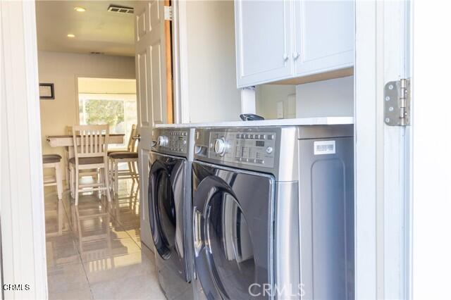 412 South Kenneth Road Burbank, CA 91501 - Photo 9 of 24 a view of a kitchen with a washer and dryer