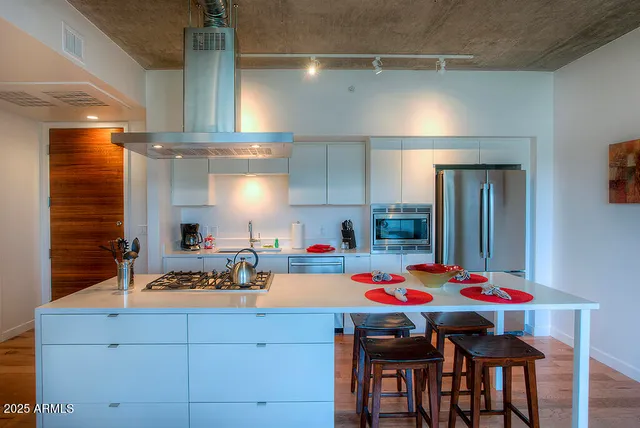 a room with table and chairs