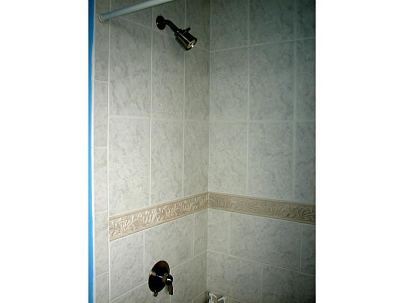 3 Tellier Road Narragansett, RI 02882 - Photo 17 of 25 Bathroom. Tiled tub/shower