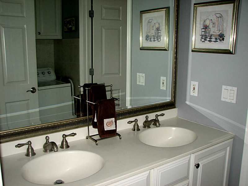 3 Tellier Road Narragansett, RI 02882 - Photo 18 of 25 Bathroom. Double vanity and laundry