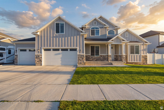 36 West Syracuse Road Vineyard, UT 84059 - Photo 2 of 56 Contemporary two-story residence featuring light gray siding and stone veneer accents