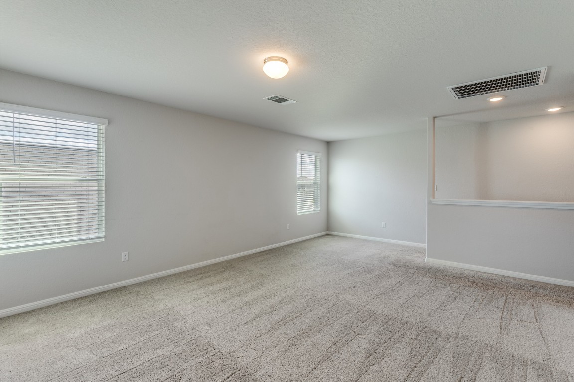 12912 Cerro Castellan Trace Manor, TX 78653 - Photo 14 of 36 a view of an empty room with a window