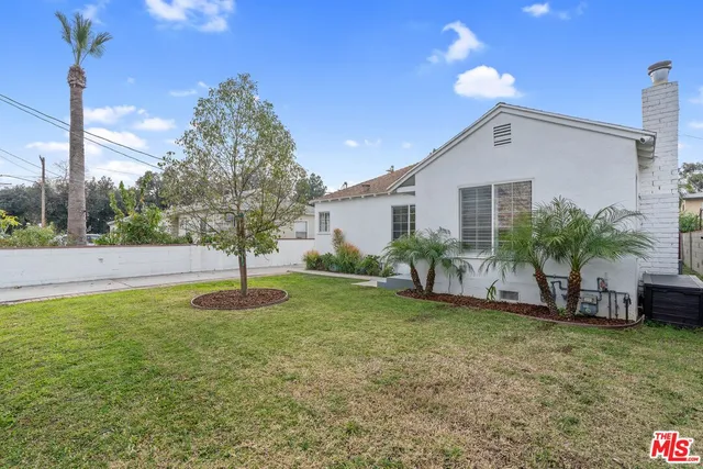 a house view with a garden space