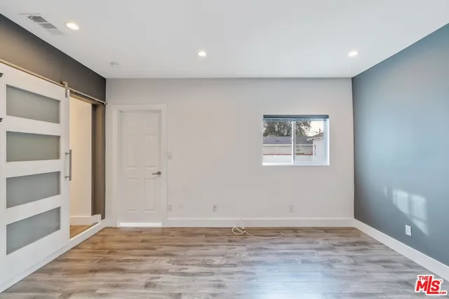 a bathroom with a shower and toilet