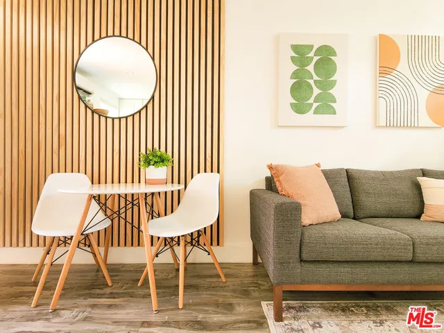 a kitchen with kitchen island a counter space and a sink