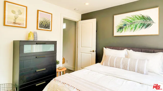 a kitchen with stainless steel appliances granite countertop a stove and a microwave