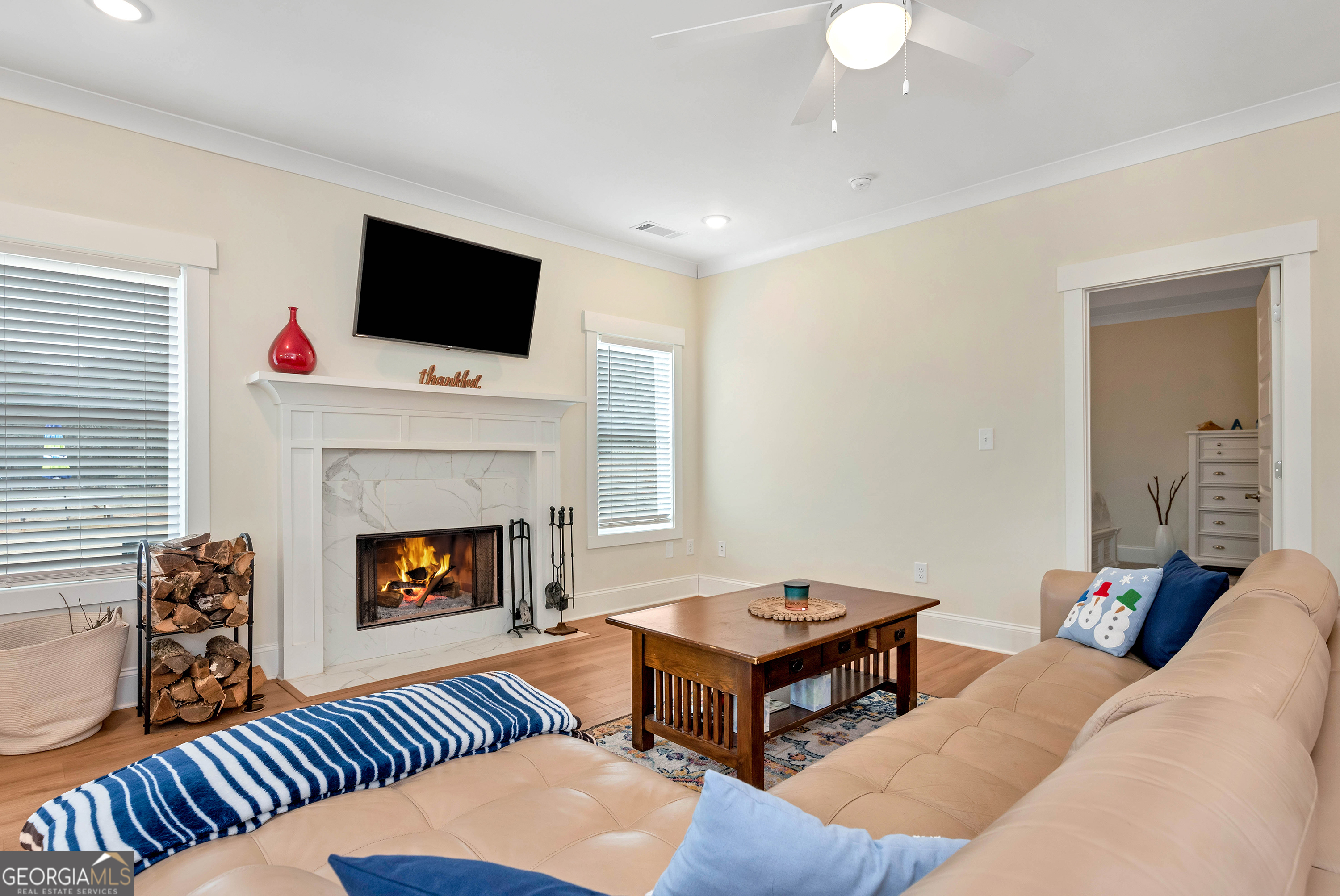 1350-c O Draper Road Comer, GA 30629 - Photo 15 of 40 a living room with furniture fireplace and flat screen tv