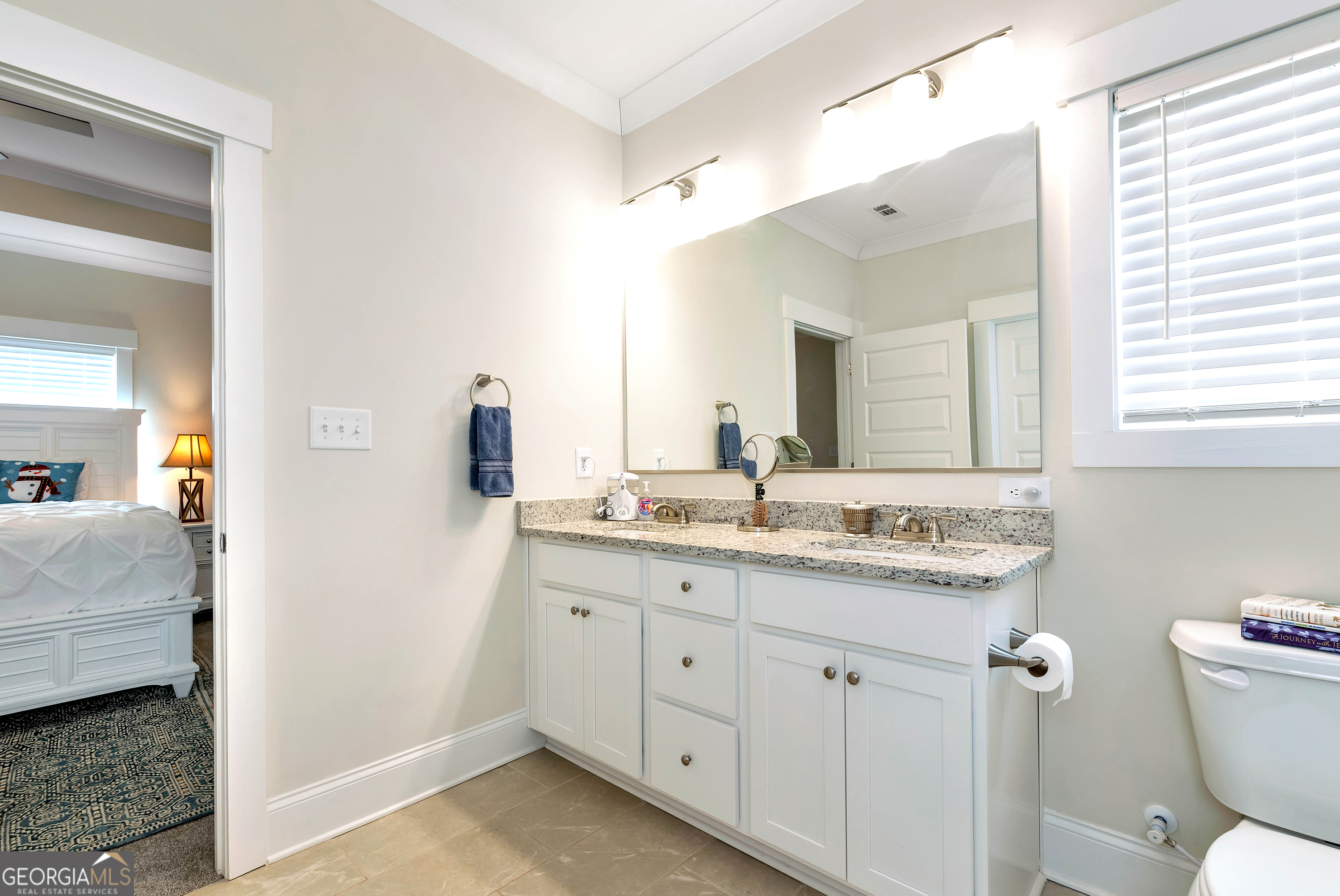 1350-c O Draper Road Comer, GA 30629 - Photo 21 of 40 a bathroom with a granite countertop sink mirror and a toilet