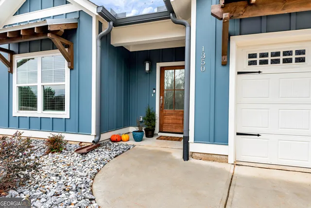 a front view of a house with a garage