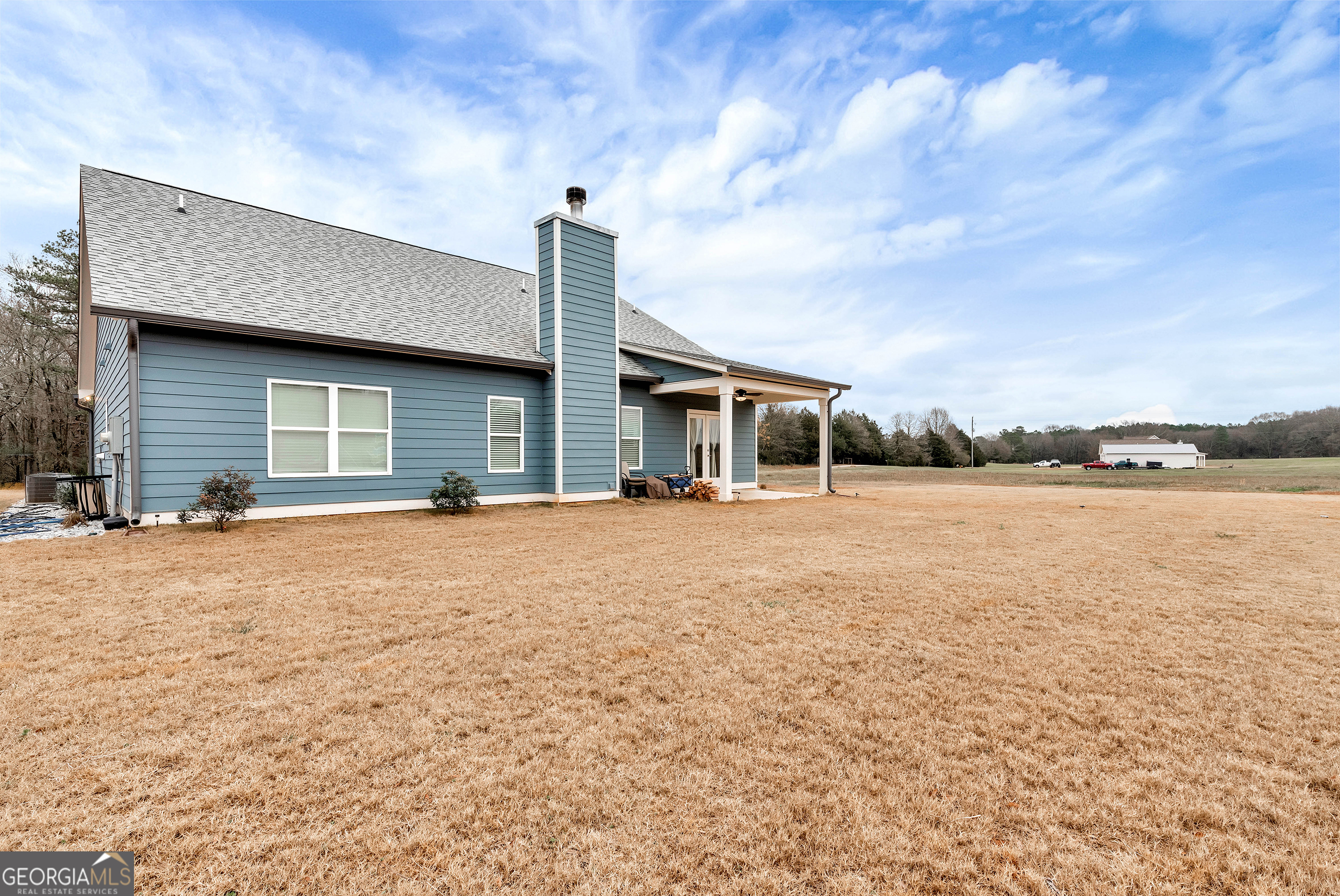 1350-c O Draper Road Comer, GA 30629 - Photo 34 of 40 a house view with swimming pool and a yard