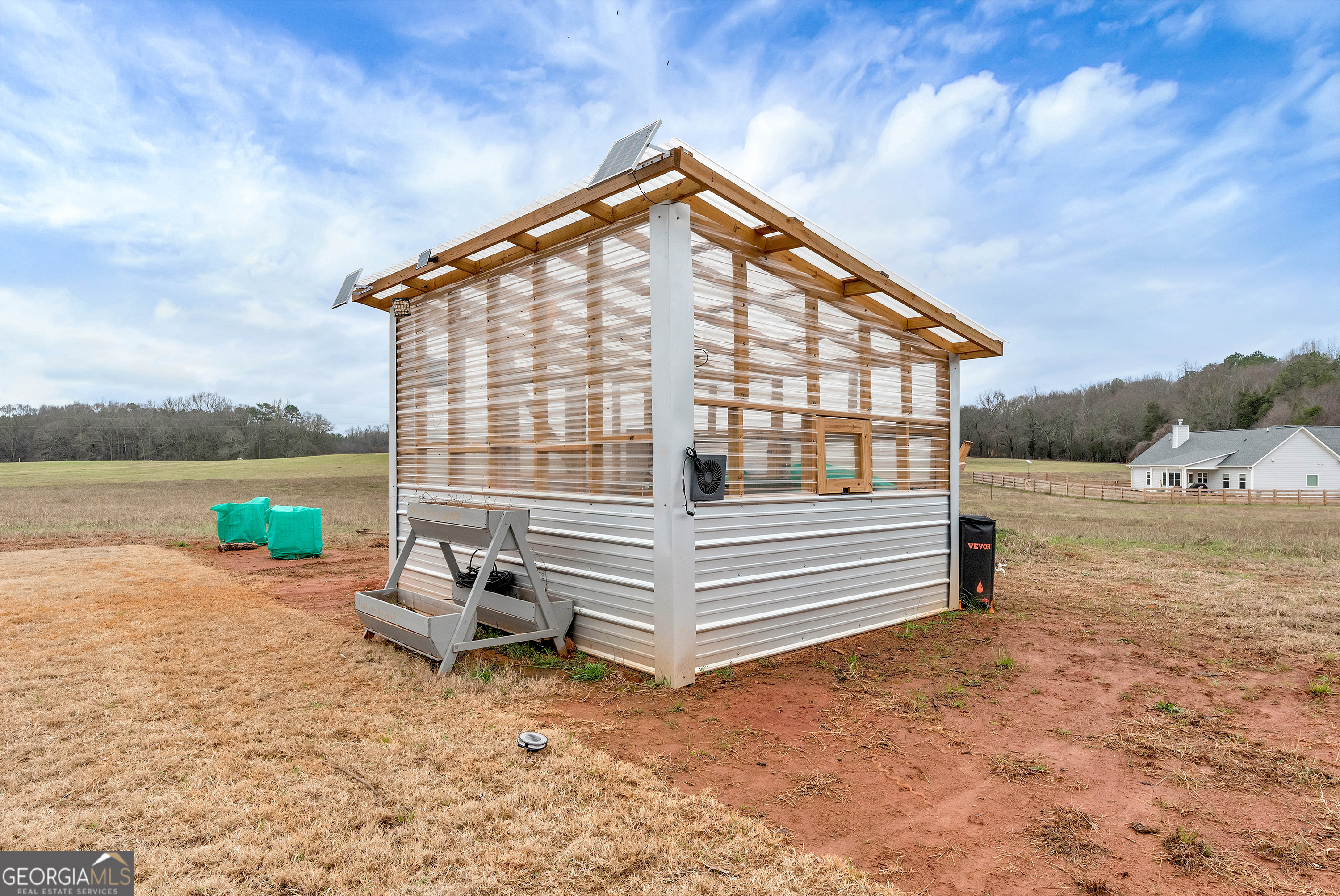 1350-c O Draper Road Comer, GA 30629 - Photo 36 of 40 a front view of a house with garden