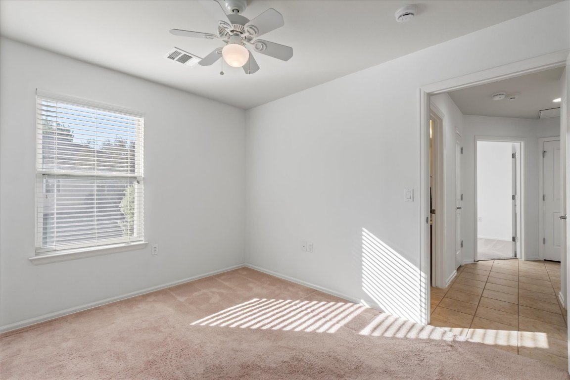 325 Barrington Farm Court Georgetown, TX 78633 - Photo 18 of 40 a view of an empty room with a window