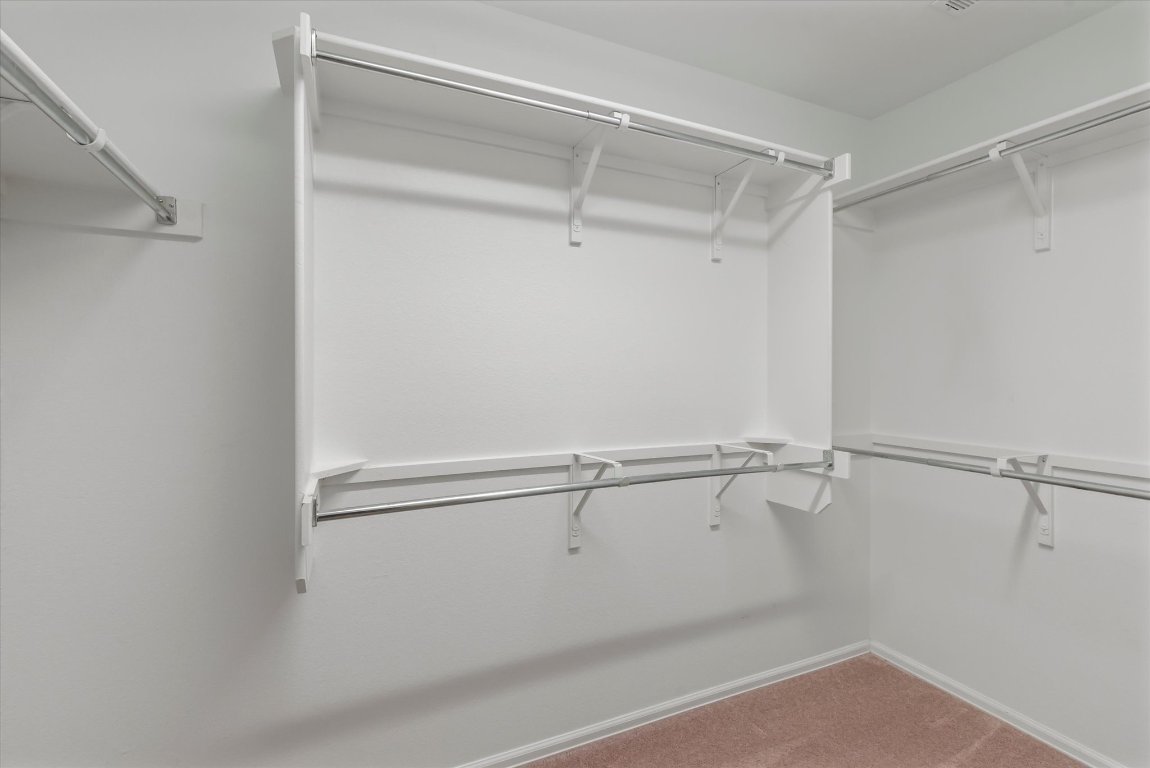 325 Barrington Farm Court Georgetown, TX 78633 - Photo 24 of 40 a view of an empty walk in closet