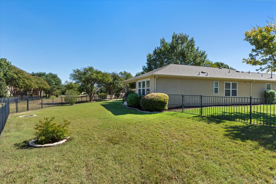 325 Barrington Farm Court Georgetown, TX 78633 - Photo 29 of 40 a view of a house with a backyard