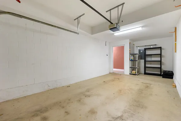 a view of empty room with a ceiling fan