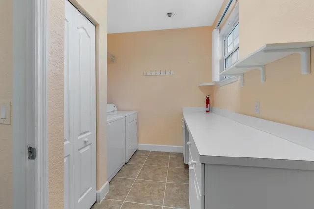 a bathroom with a sink and vanity