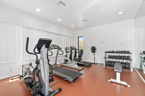a view of a room with gym equipment