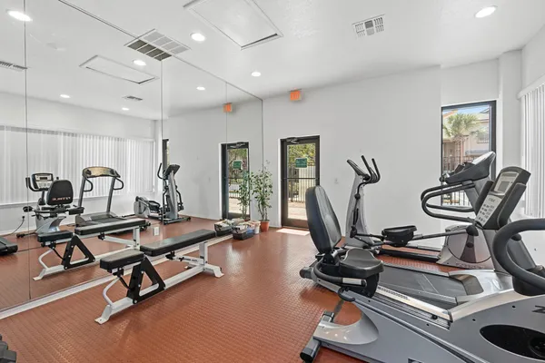 a view of a room with gym equipment