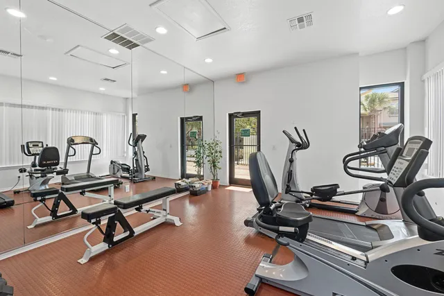 a view of a room with gym equipment