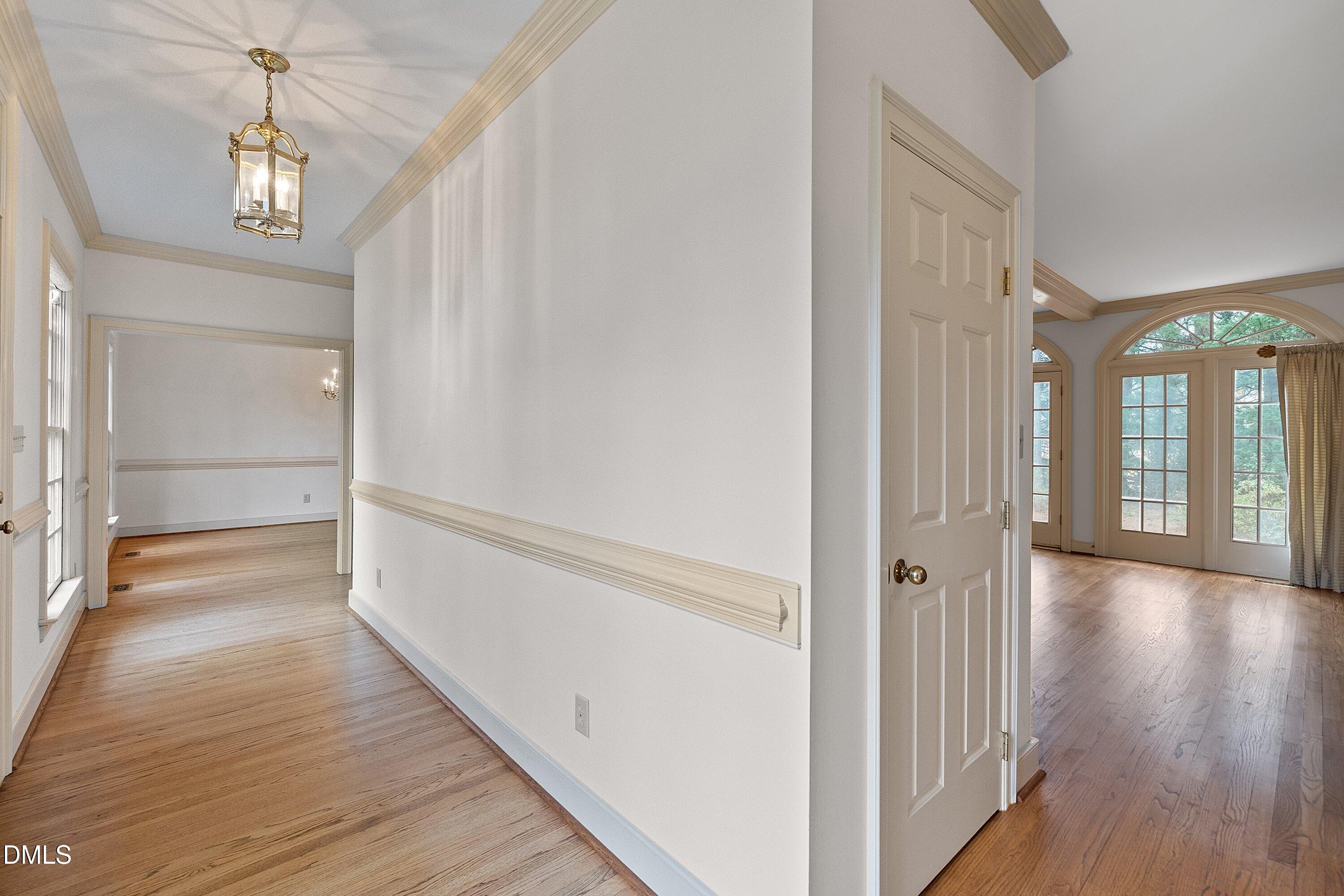 1708 Sawgrass Court Raleigh, NC 27615 - Photo 11 of 60 Hardwoods Throughout Main Floor