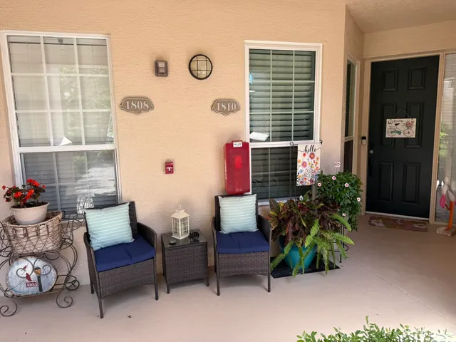 a outdoor living space with furniture and a window