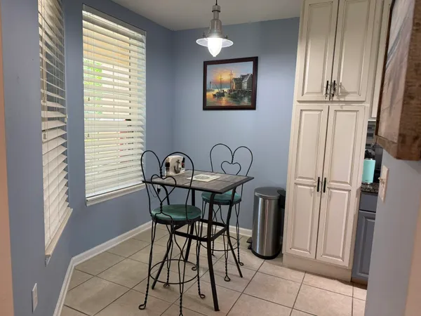 a kitchen with stainless steel appliances granite countertop a refrigerator stove and sink