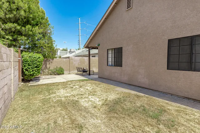 a view of a backyard of the house