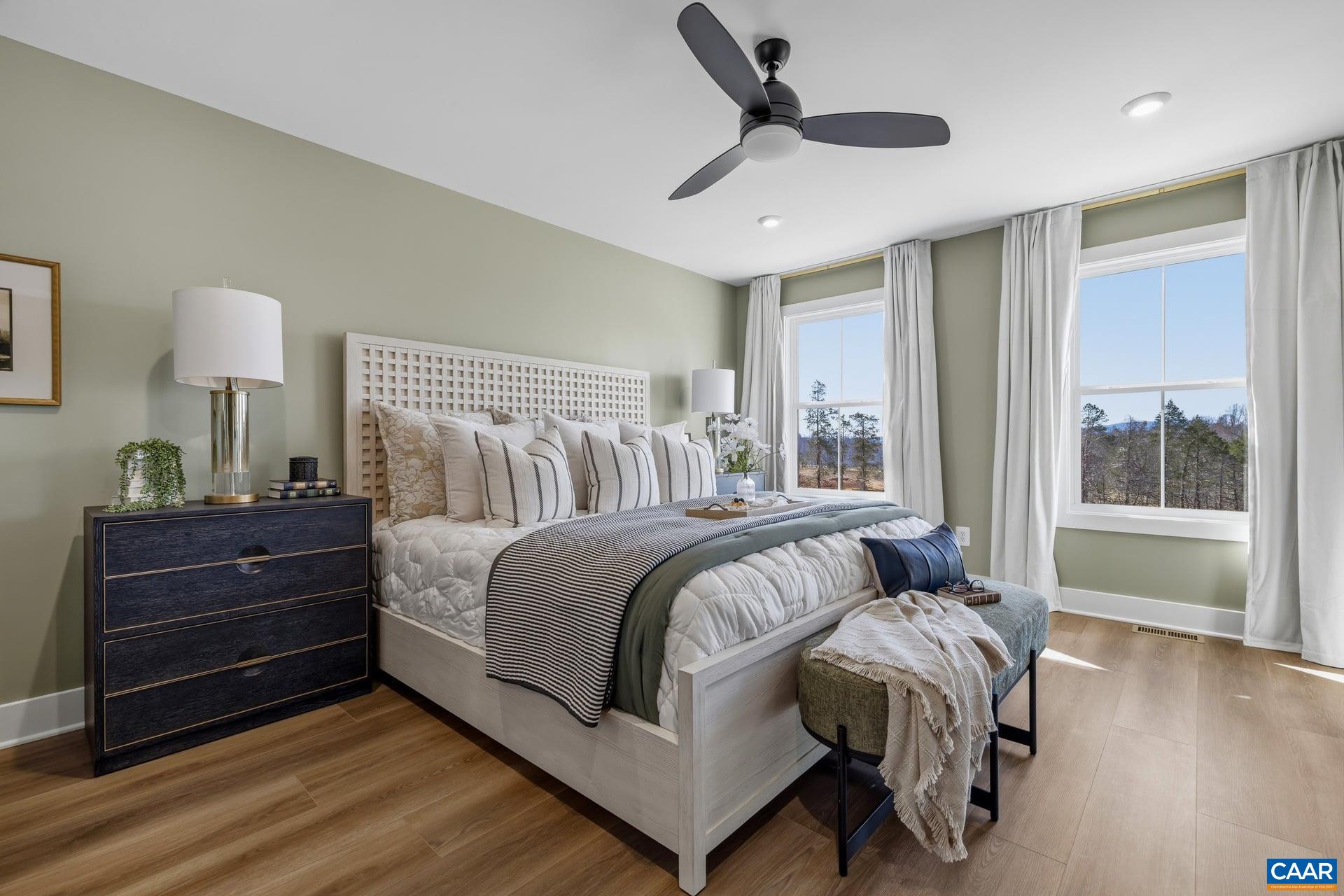 48 B Miranda Crossing Charlottesville, VA 22901 - Photo 14 of 28 a bedroom with a large bed and a window