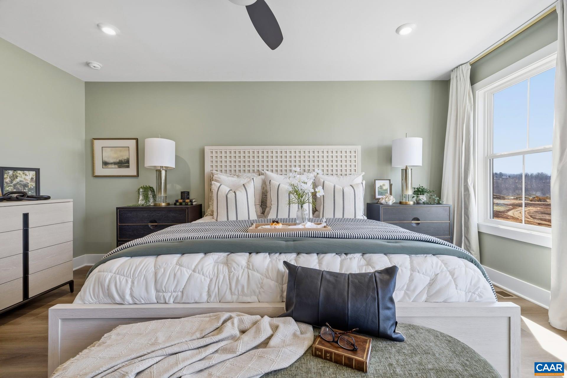 48 B Miranda Crossing Charlottesville, VA 22901 - Photo 15 of 28 a bedroom with a bed and window