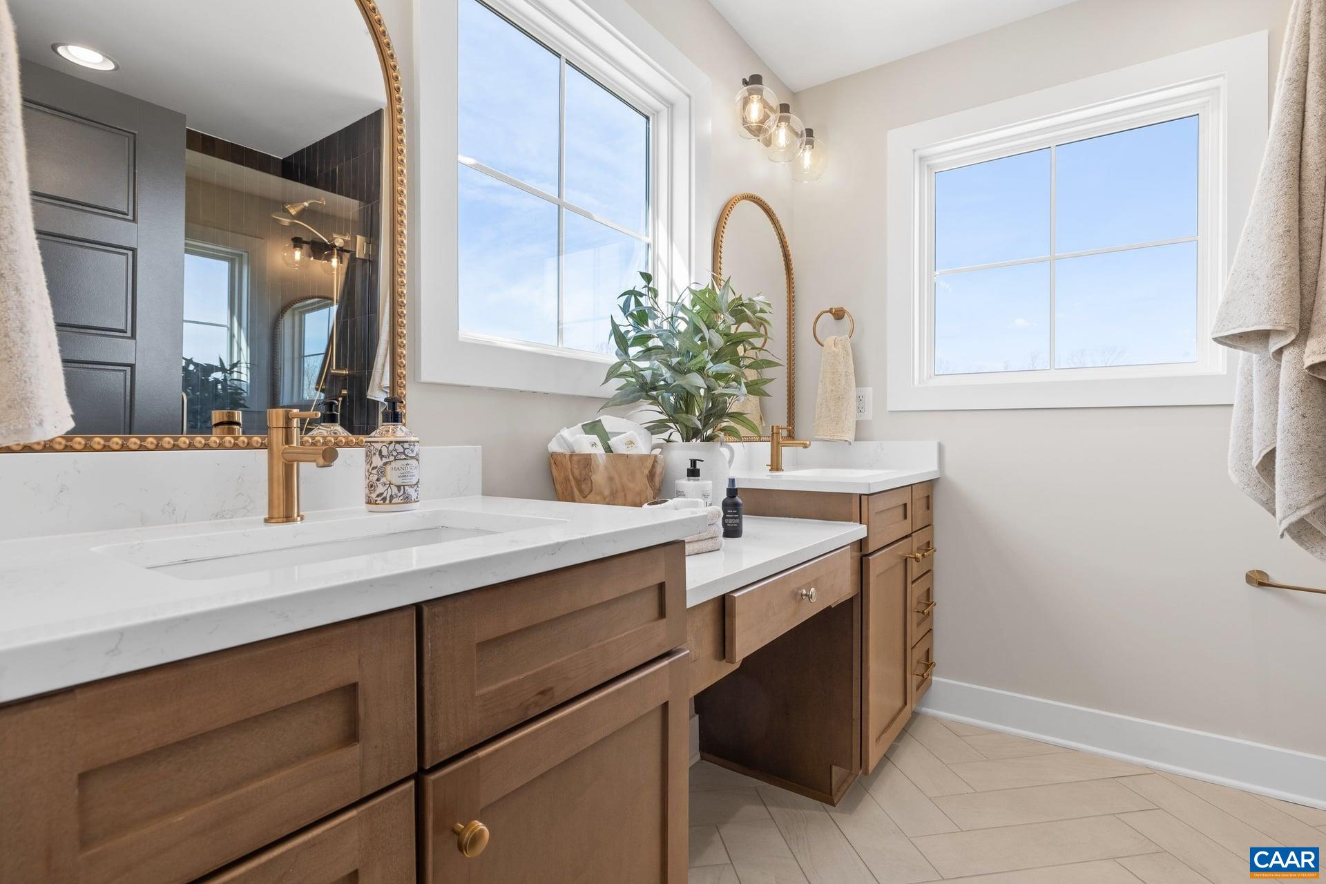 48 B Miranda Crossing Charlottesville, VA 22901 - Photo 16 of 28 a bathroom with a sink and a mirror