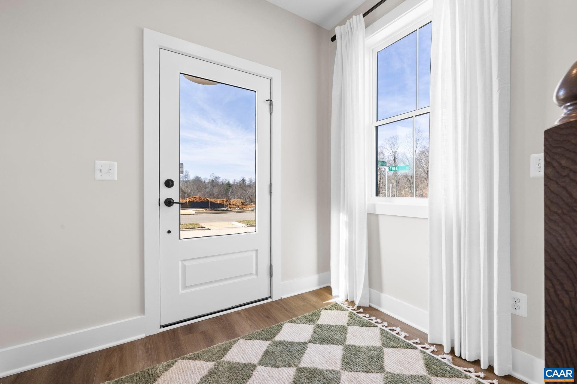 48 B Miranda Crossing Charlottesville, VA 22901 - Photo 3 of 28 a view of an empty room with a window
