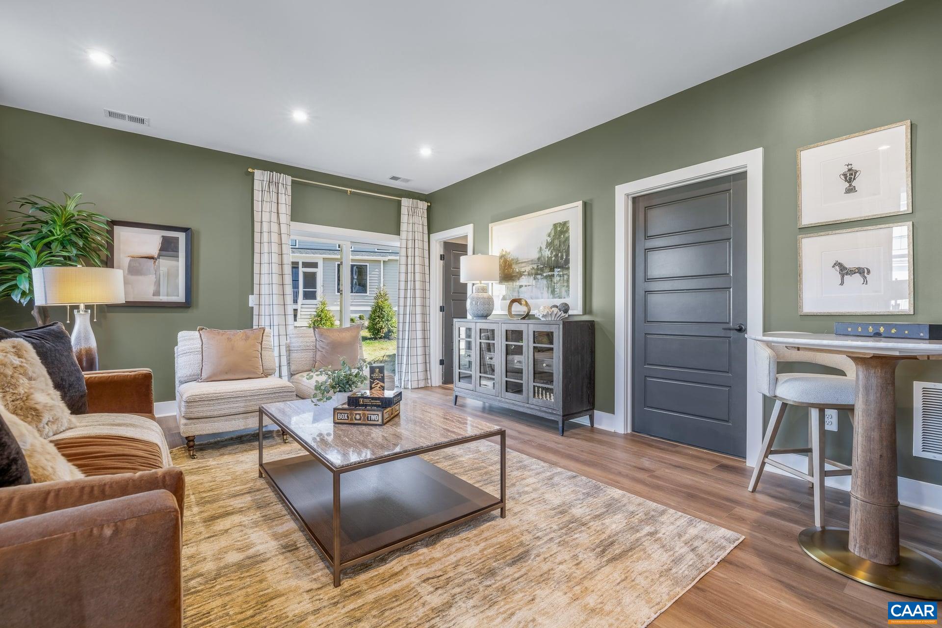 48 B Miranda Crossing Charlottesville, VA 22901 - Photo 4 of 28 a living room with furniture and wooden floor