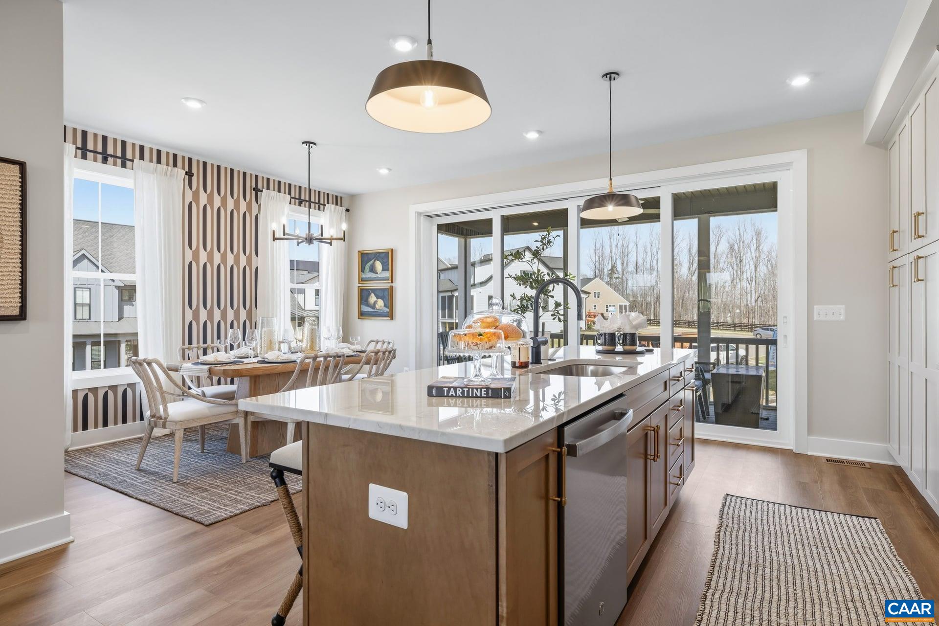 48 B Miranda Crossing Charlottesville, VA 22901 - Photo 7 of 28 a kitchen with counter top space appliances and windows