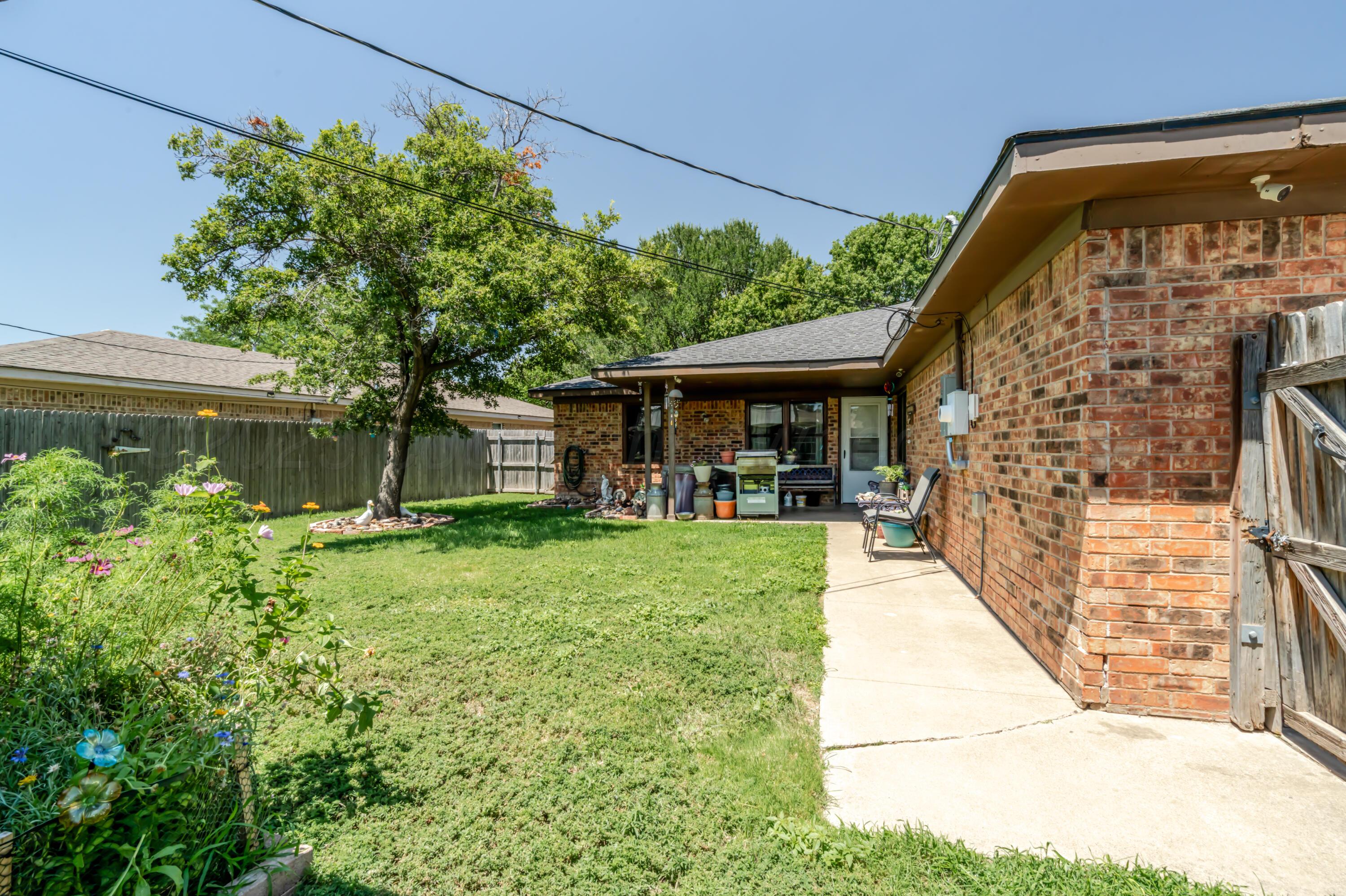 7909 Gerald Drive Amarillo, TX 79121 - Photo 24 of 26 front view of a house with a yard
