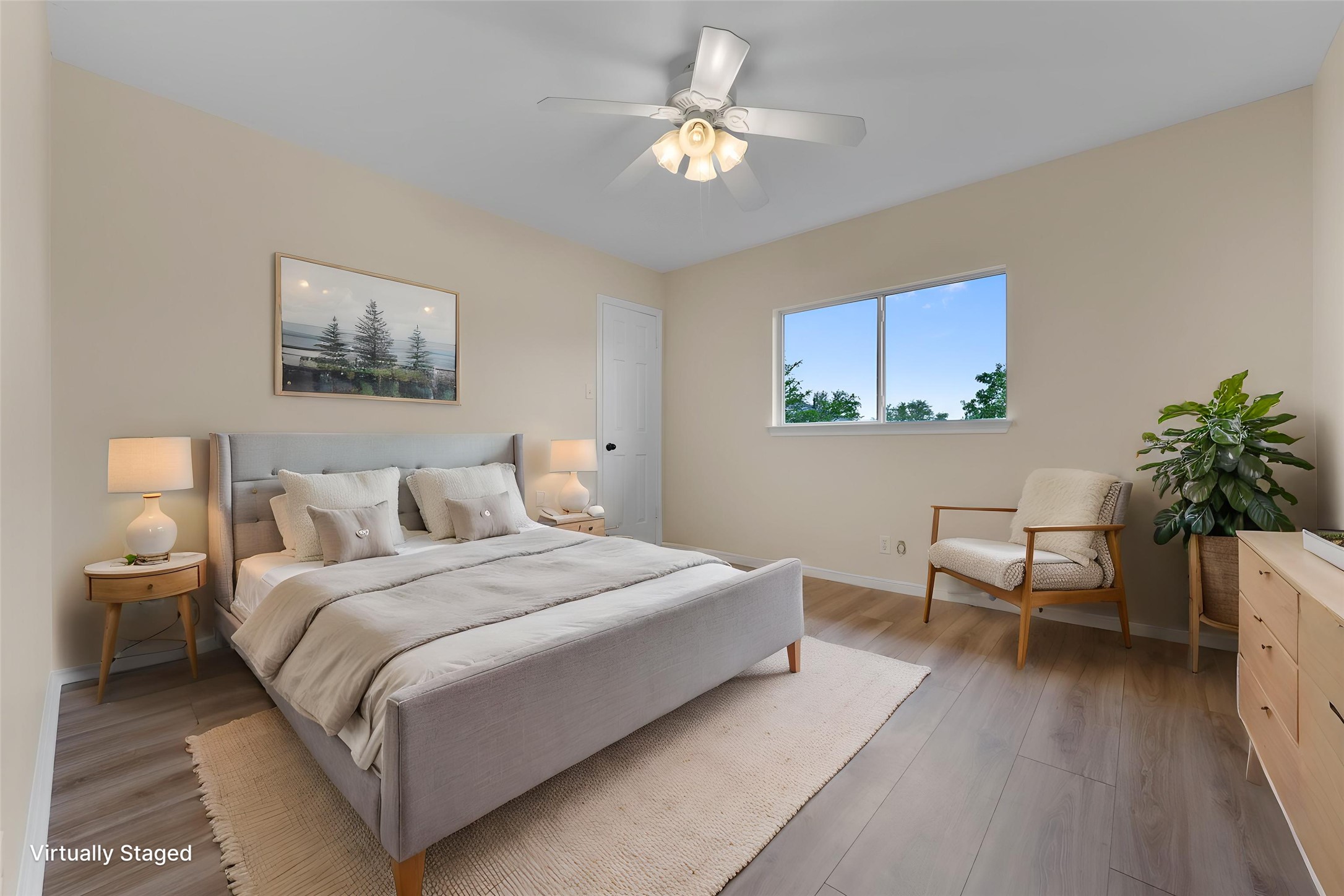 7327 Pusch Ridge Loop Austin, TX 78749 - Photo 15 of 26 A tranquil bedroom provides comfort with durable flooring and a refreshing ceiling fan.