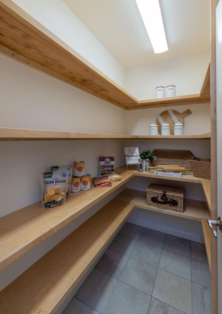 573 Meadow Road Aptos, CA 95003 - Photo 15 of 53 a kitchen with a cabinets and a stove