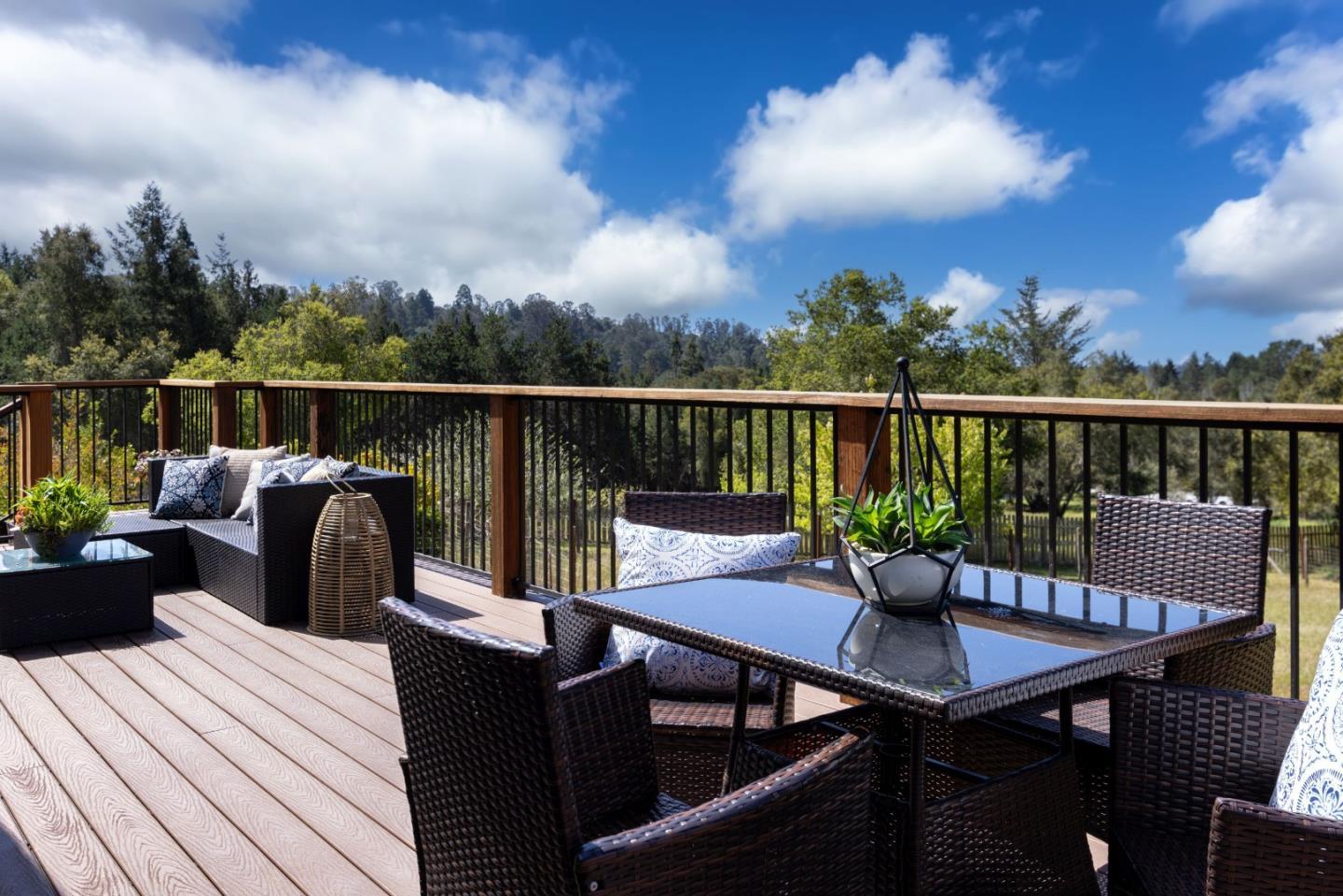 573 Meadow Road Aptos, CA 95003 - Photo 26 of 53 a view of a balcony with two chairs