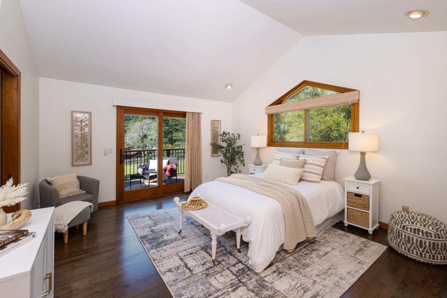 573 Meadow Road Aptos, CA 95003 - Photo 28 of 53 a bedroom with a bed and wooden floor