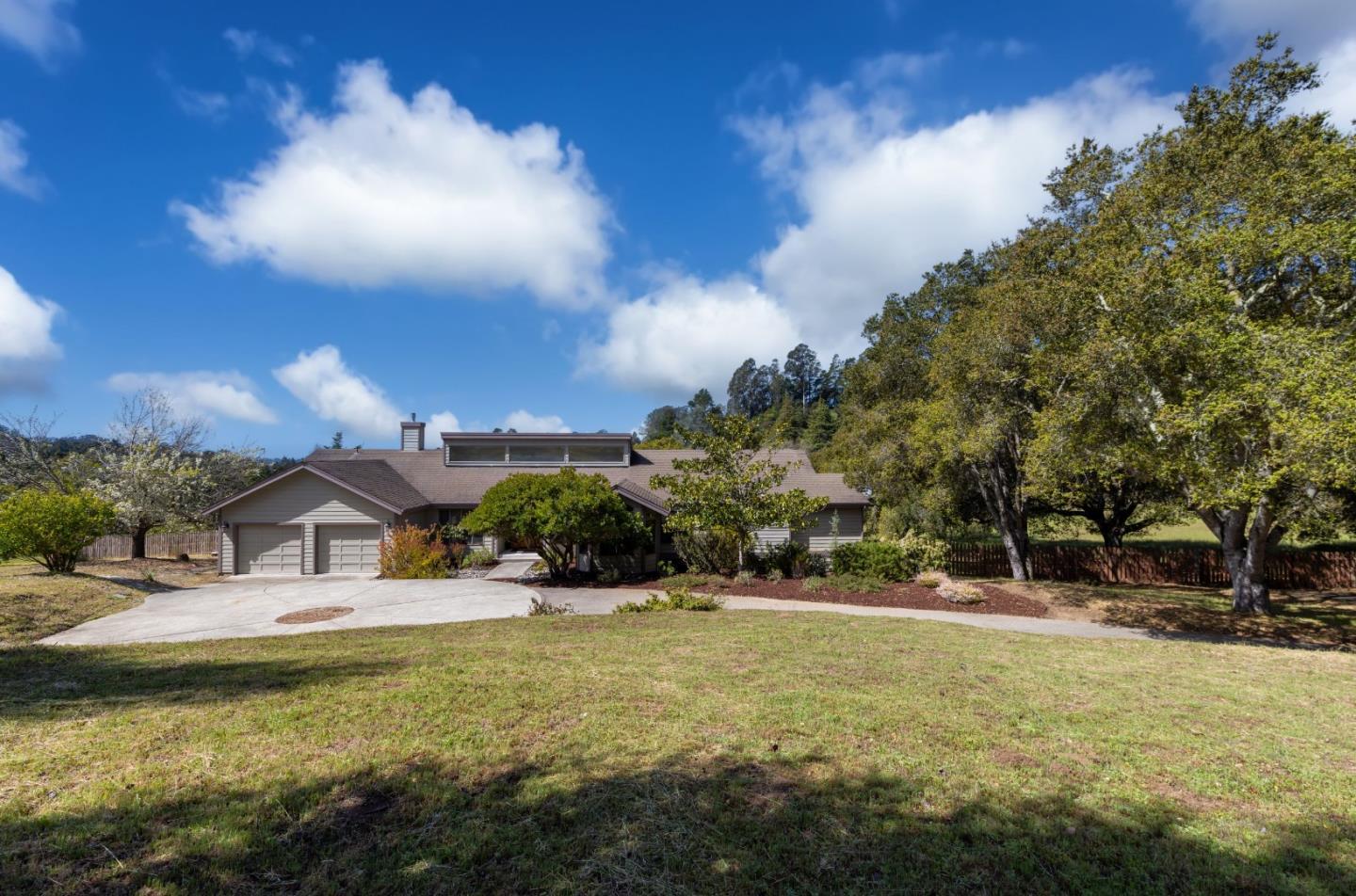 573 Meadow Road Aptos, CA 95003 - Photo 3 of 53 a swimming pool with outdoor seating and yard