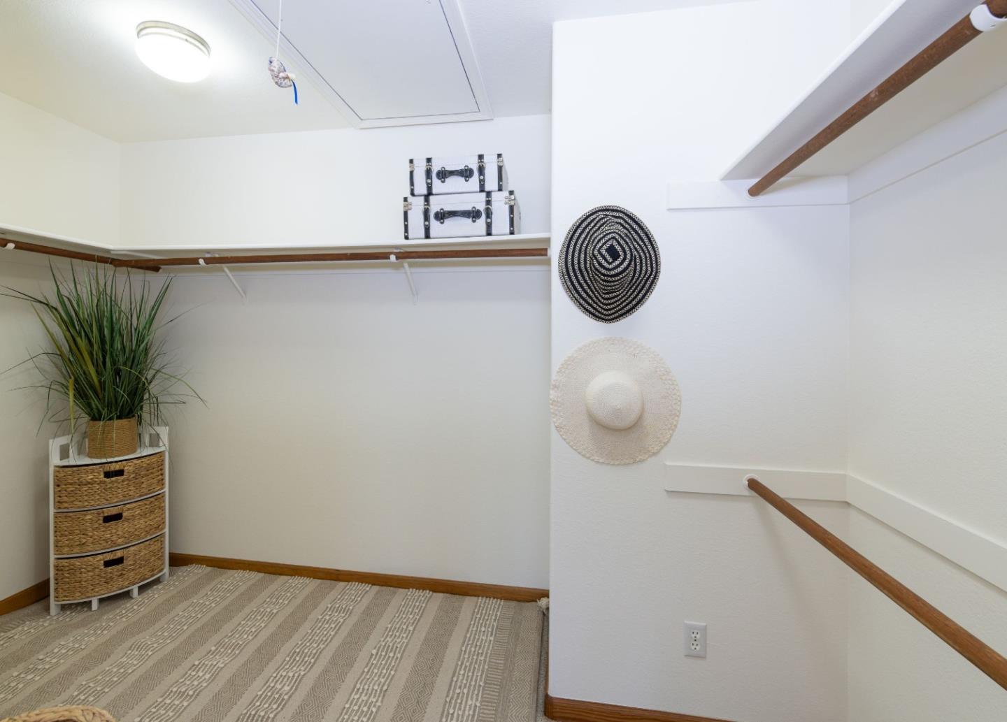 573 Meadow Road Aptos, CA 95003 - Photo 31 of 53 a view of a hallway to room with wooden floor