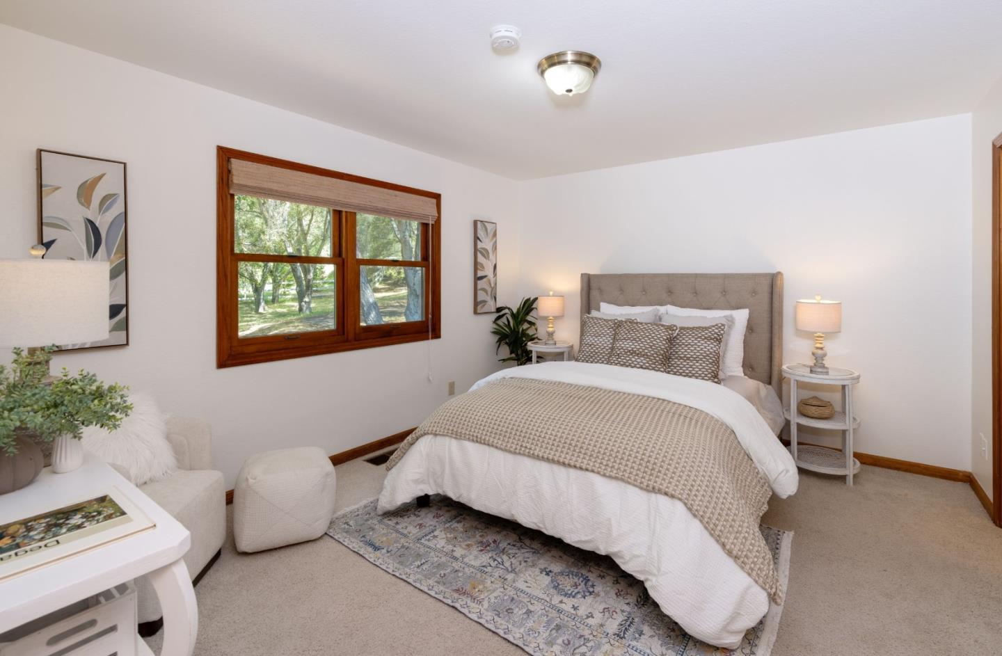 573 Meadow Road Aptos, CA 95003 - Photo 40 of 53 a bedroom with a bed and a potted plant