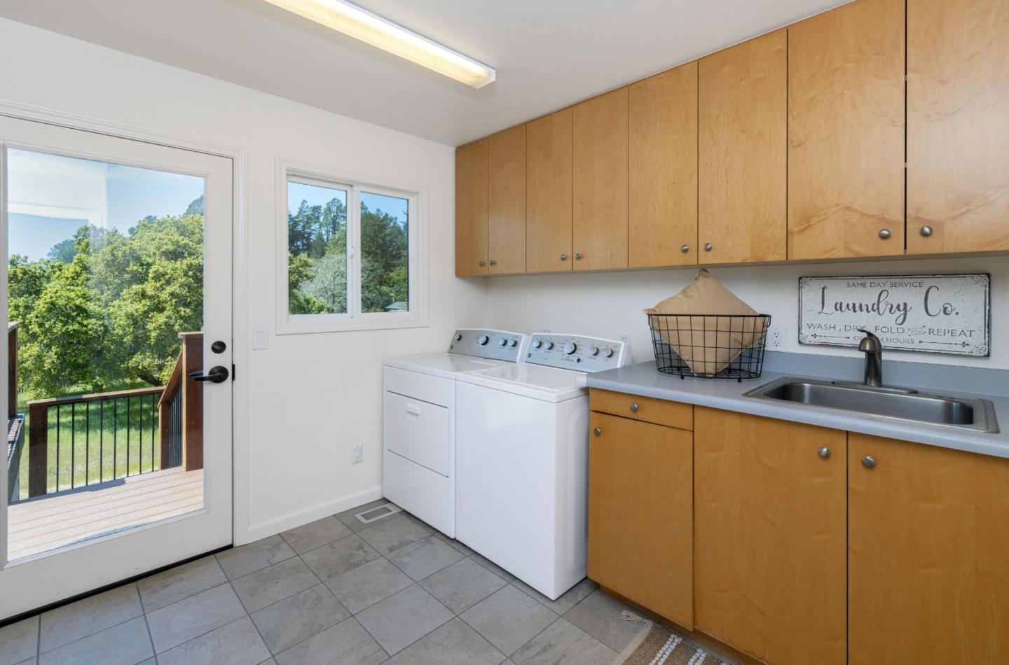 573 Meadow Road Aptos, CA 95003 - Photo 48 of 53 a kitchen with a sink and cabinets