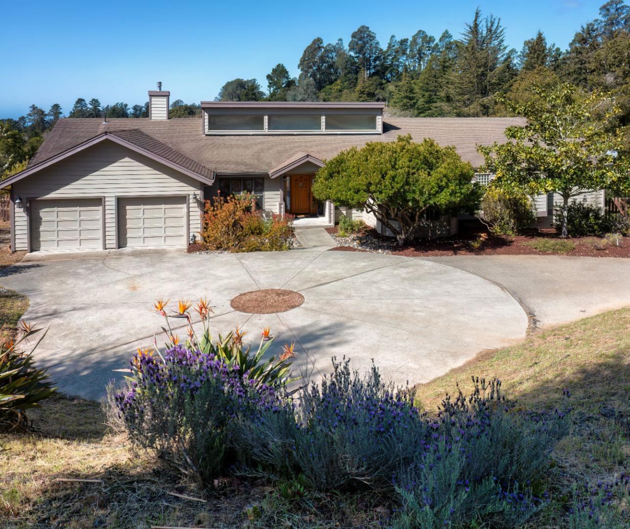 573 Meadow Road Aptos, CA 95003 - Photo 5 of 53 a front view of a house with a yard