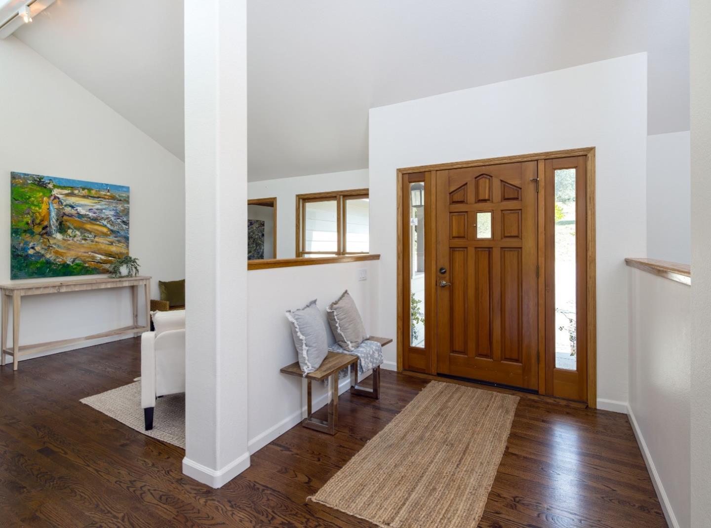 573 Meadow Road Aptos, CA 95003 - Photo 7 of 53 a living room with furniture and a wooden floor